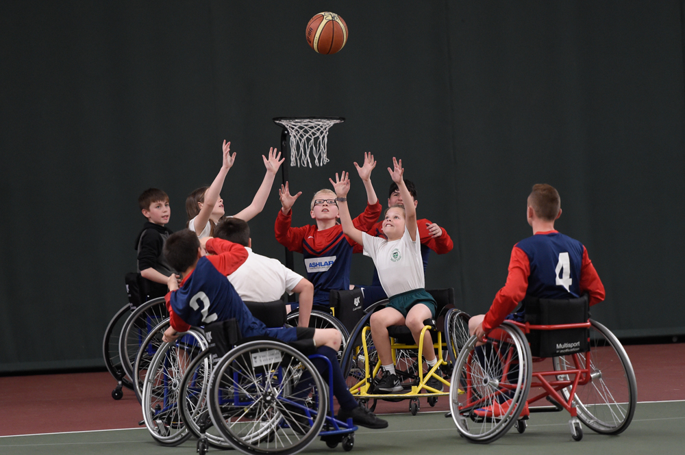 Merseyside Schoolchildren playing accessible Wheelchair Basketball