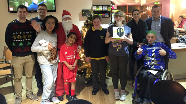 christmas_party800px Choices participants receive their gifts from Santa at the Choices Christmas Party