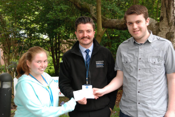 Morgan Sindall representativeJonathan Duckett presents cheque to Greenbank College students