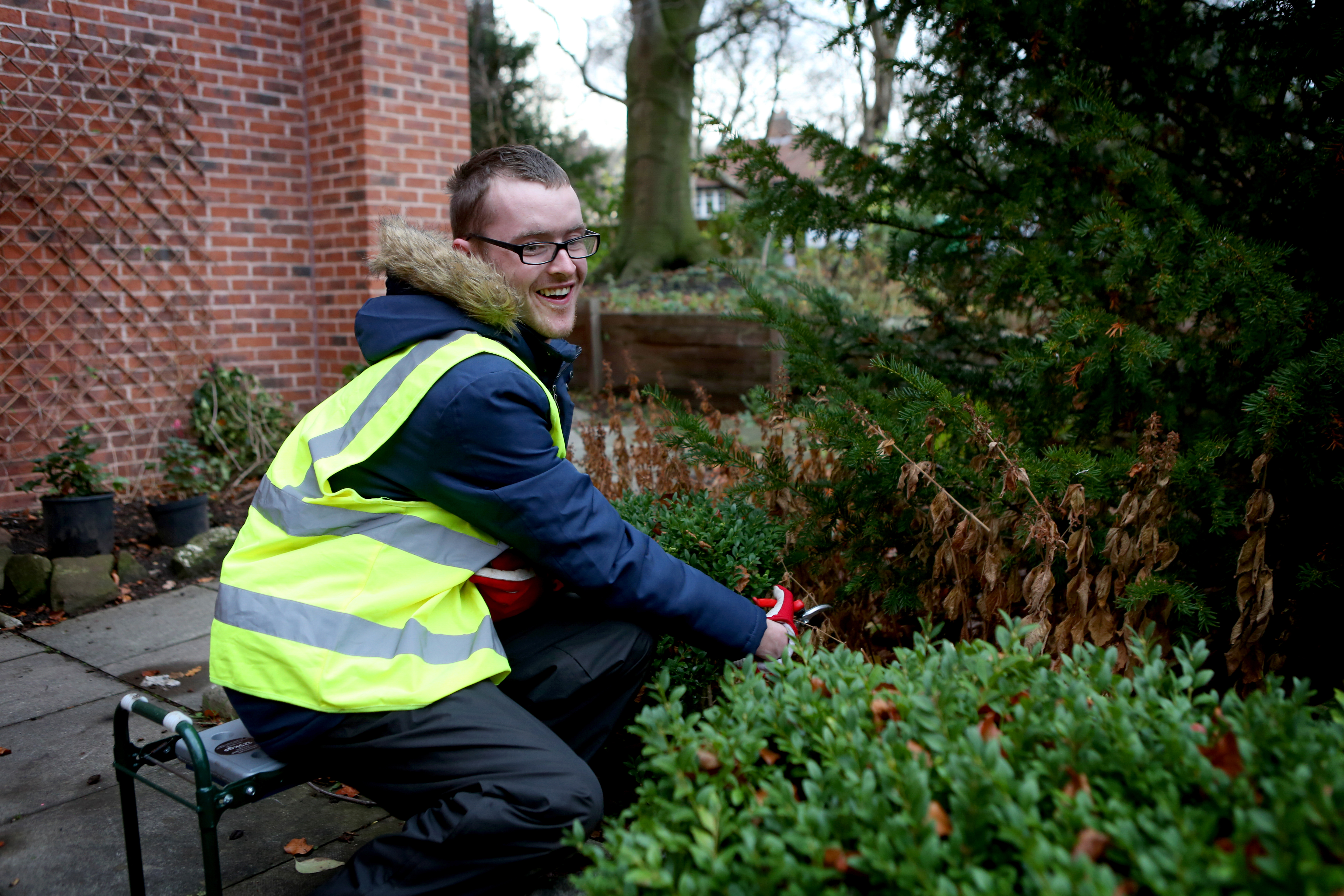 Gardening students working on the grounds at Greenbank